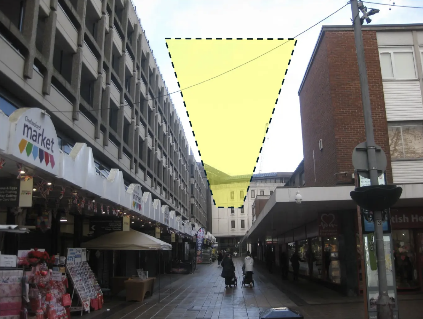 Cornhill, the pedestrian street beside the indoor market, looking up toward Market Square — where the new artwork will be installed in the airspace above.
